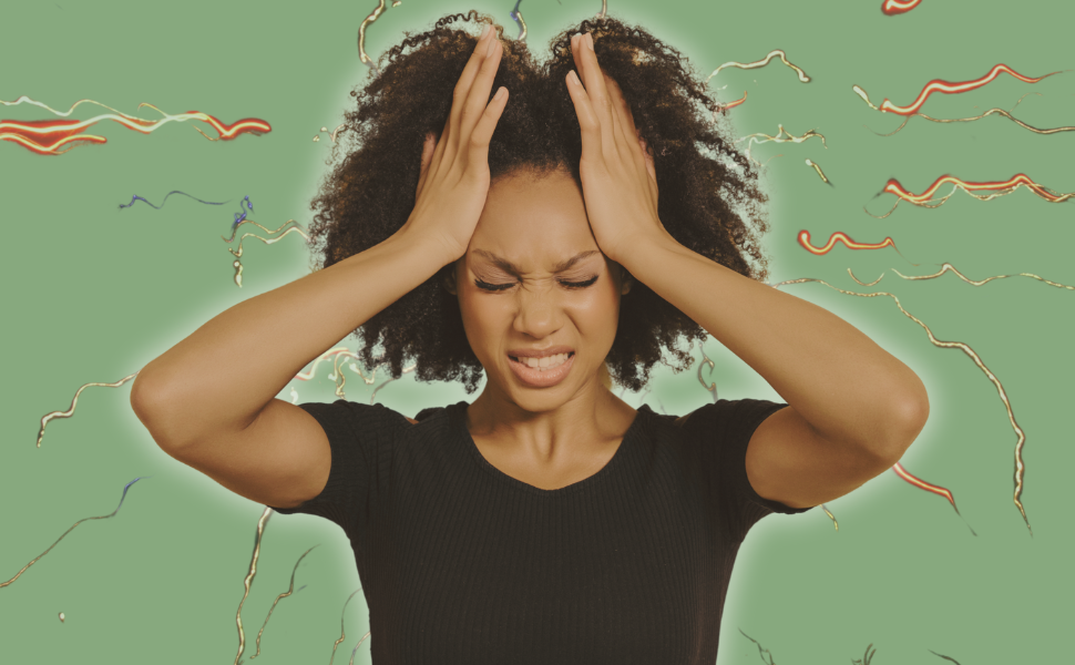 A Black women is holding her head and grimacing in pain. How to handle period headaches